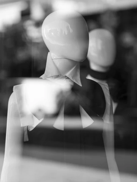 A mannequin wearing a big bow dress.