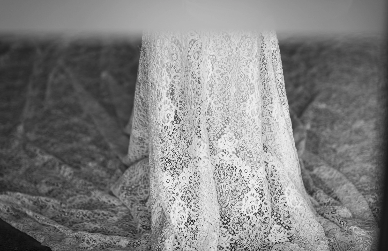 Lace bridal gown train.